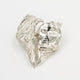 Study in Silver: self folding metal (Broken Heart Rings)