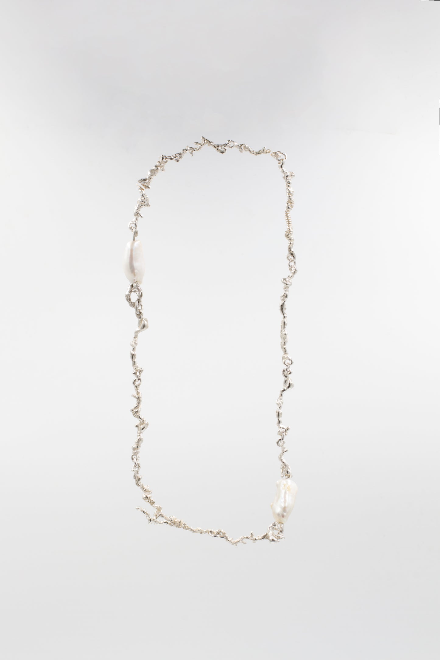 The Standard Curdled Chain with Pearls