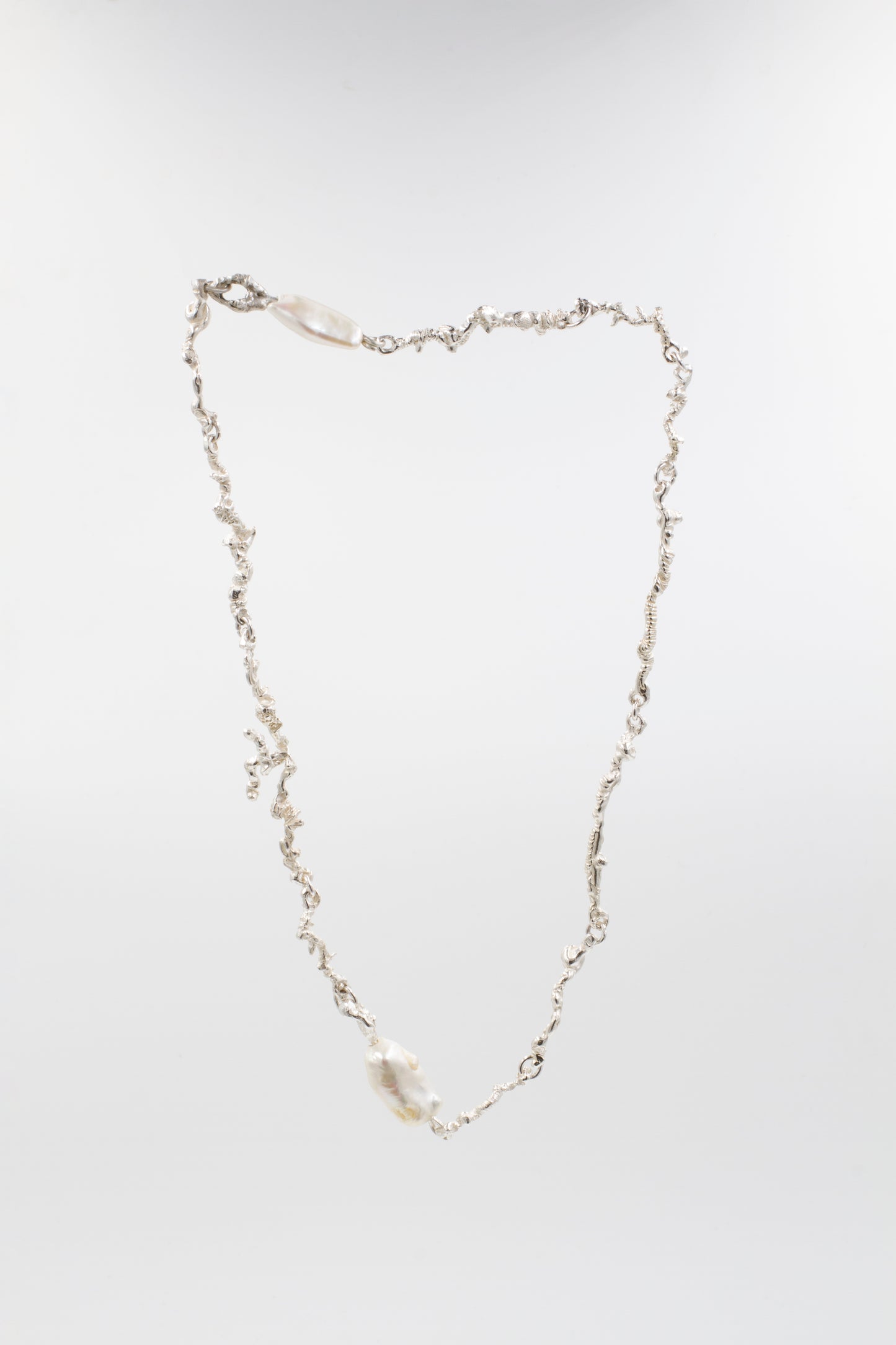 The Standard Curdled Chain with Pearls