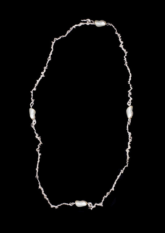 The Standard Long Curdled Chain with Pearls